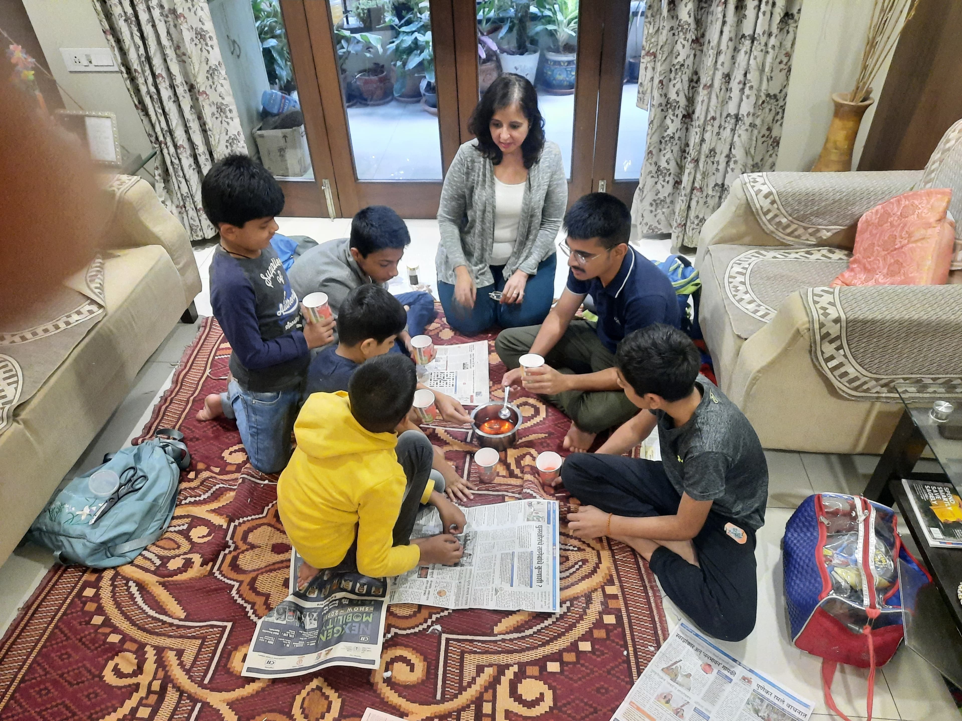 Children working on a complex multi-session project — something that looks like it took time